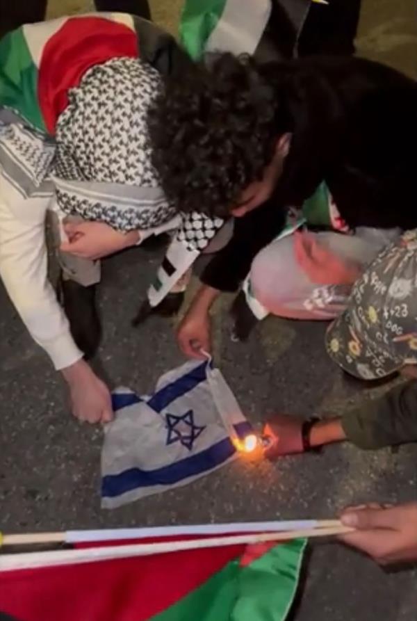 A burning of the Israeli flag was among the acts seen in New York City on Friday.